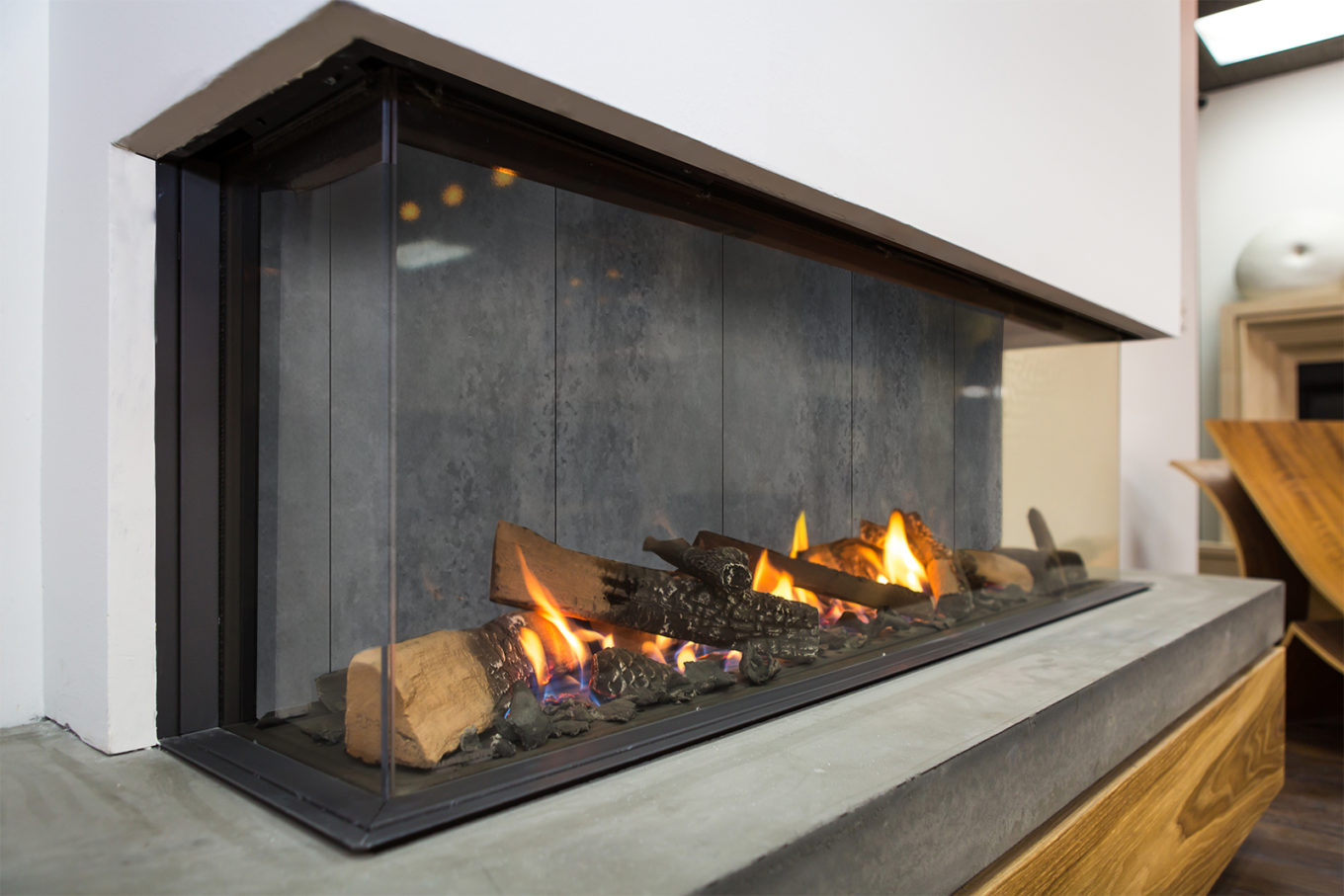 modern gas fireplace with concrete panels